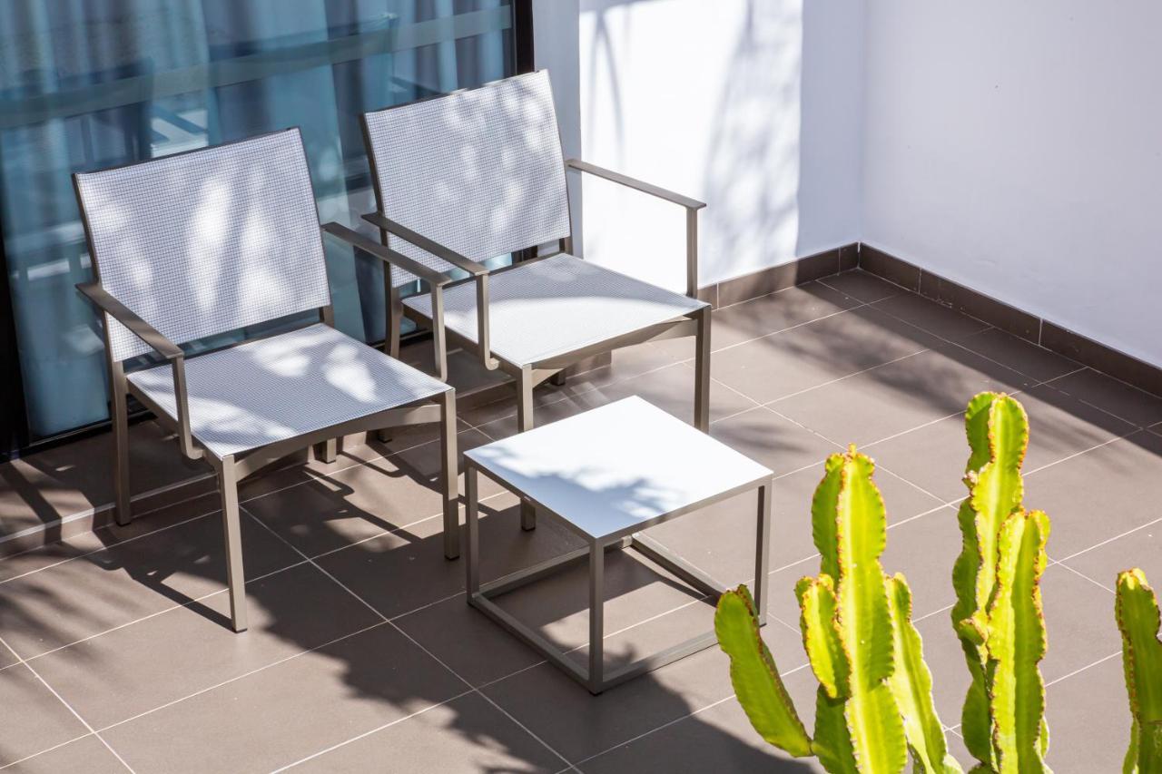 Migjorn Ibiza Suites & Spa Playa d'en Bossa Bagian luar foto