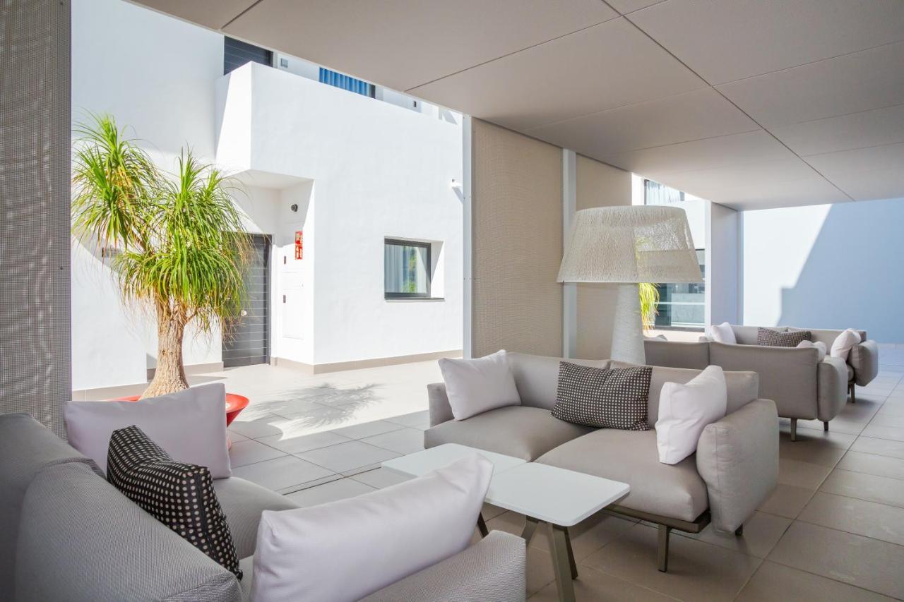 Migjorn Ibiza Suites & Spa Playa d'en Bossa Bagian luar foto